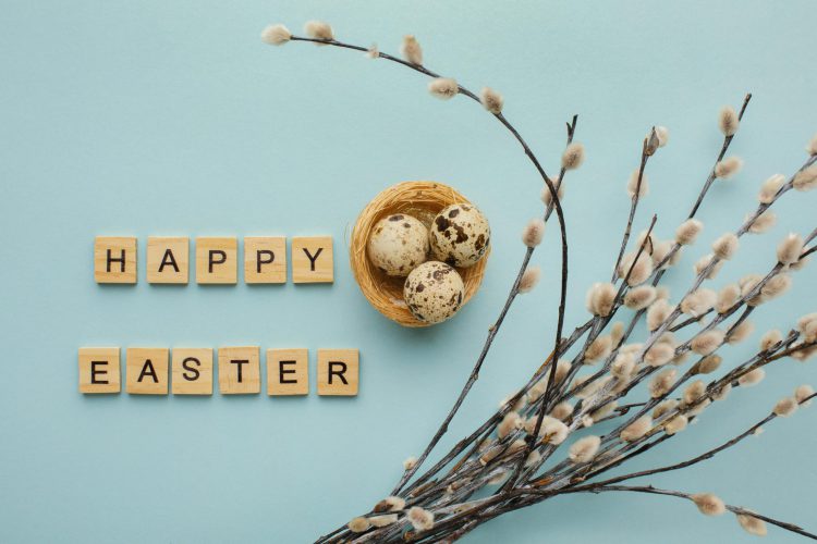 top-view-easter-eggs-with-greeting-twigs